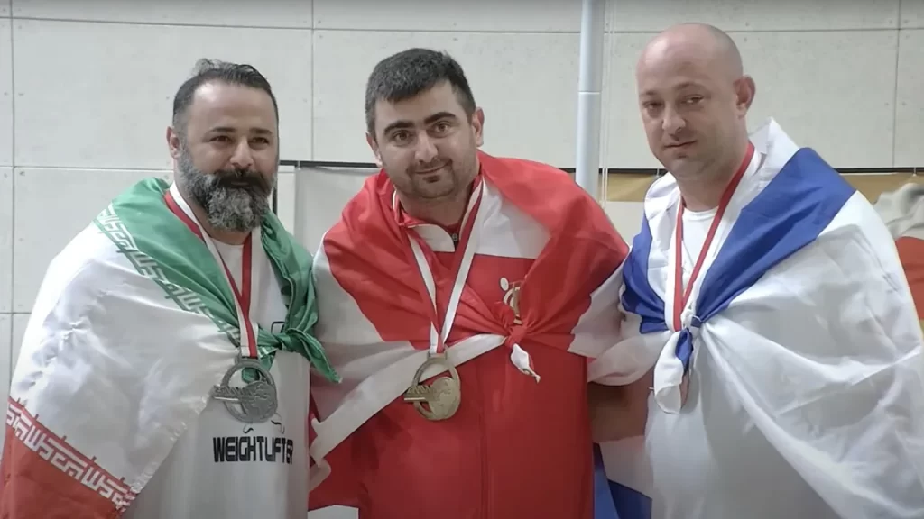 Read more about the article Islamic Republic of Iran bans weightlifter for life after he shakes hands with Israeli competitor on podium